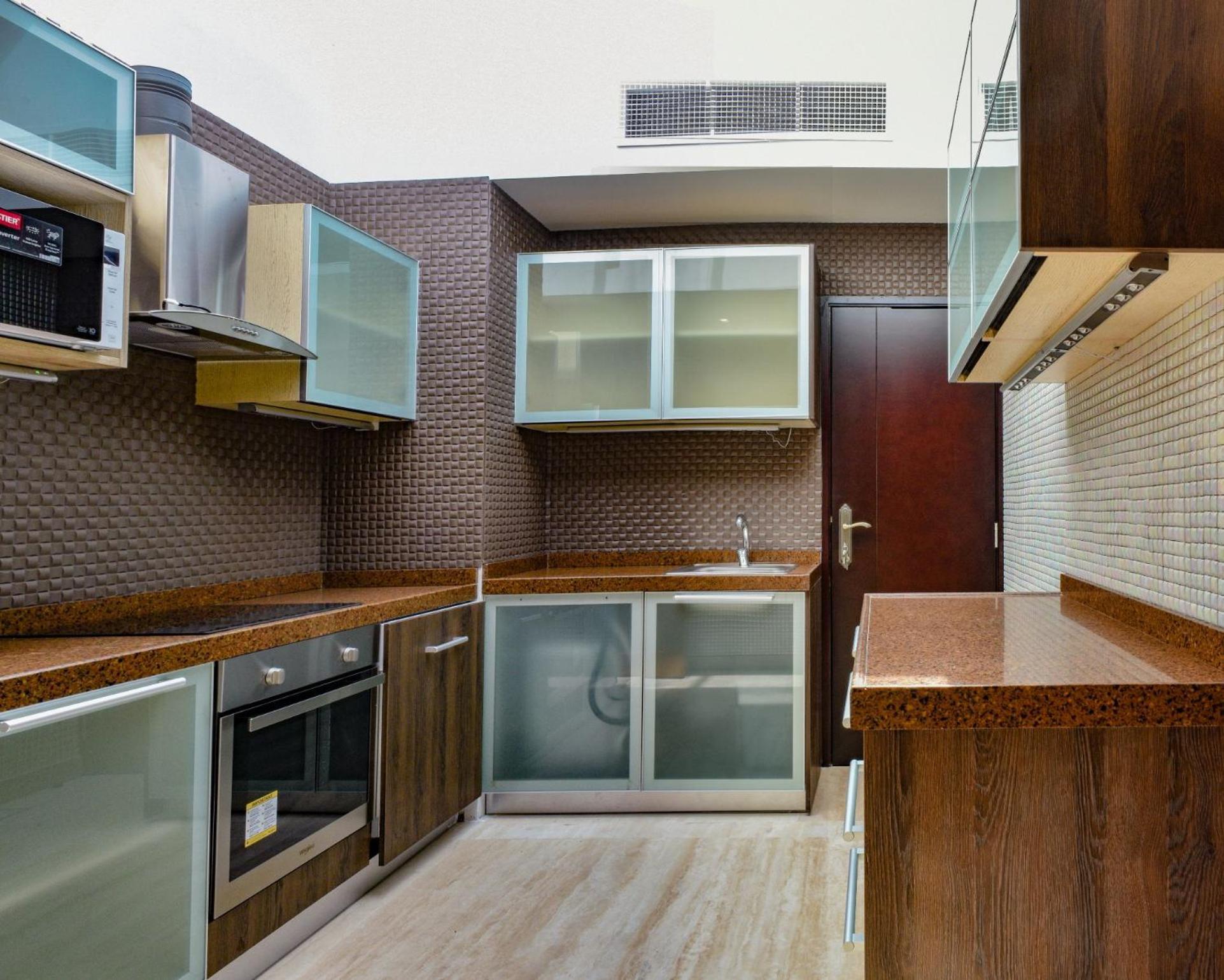 Palavra Resort Manama Exterior foto A modern kitchen