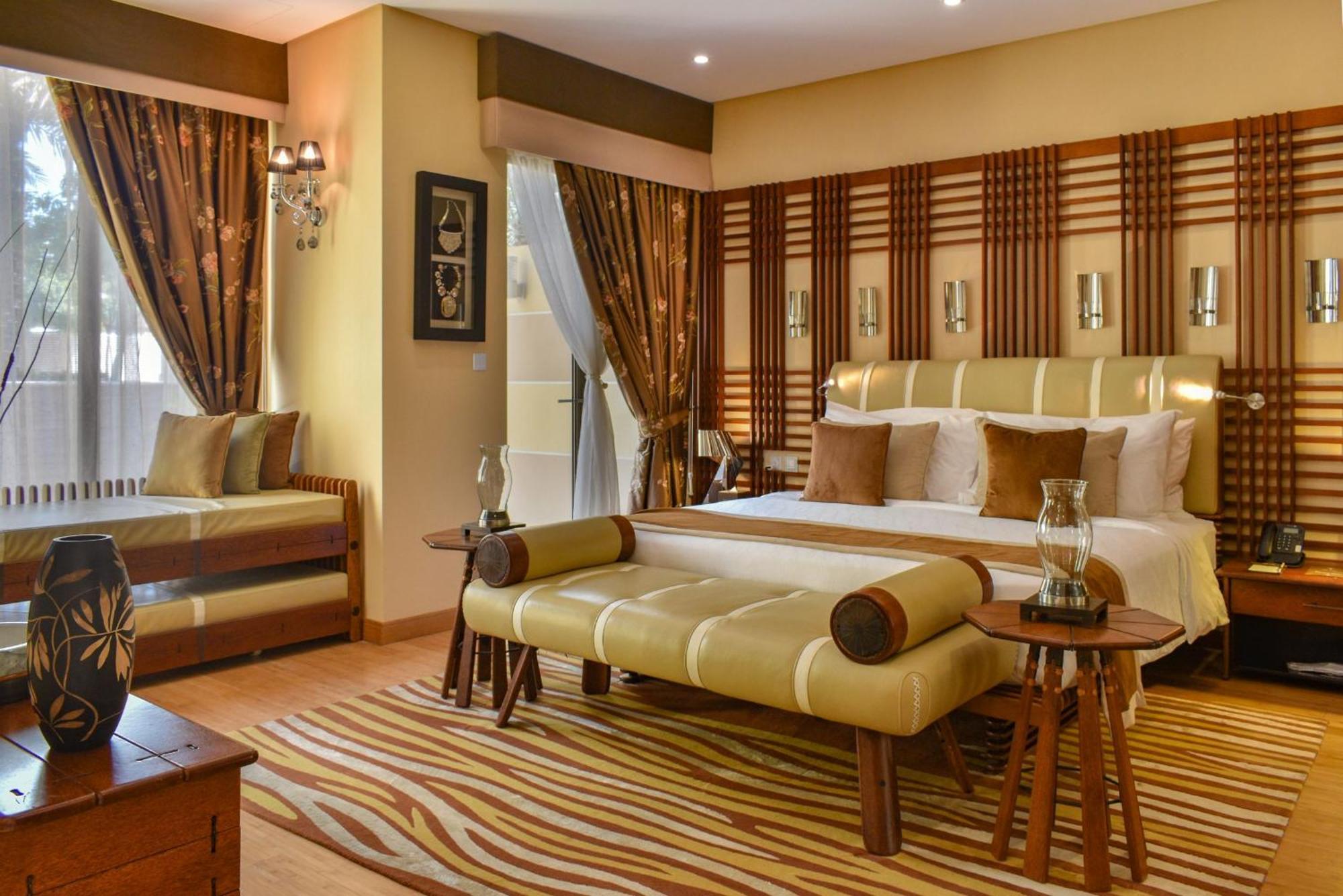 Palavra Resort Manama Exterior foto A bedroom at the Taj Bengal